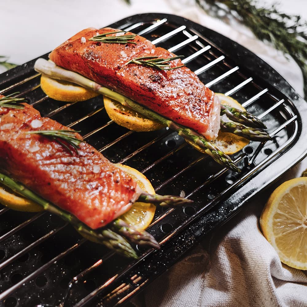 Granite Ware 3 piece multiuse set. Enameled steel bake, broiler pan, and grill with rack. Versatile for oven and direct fire cooking. Resists up to 932°F.