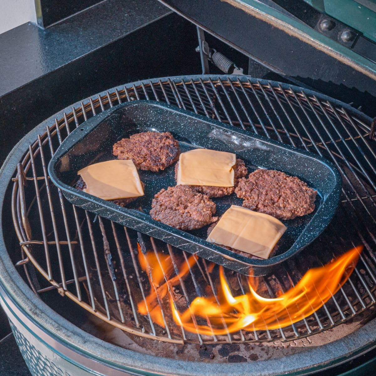Granite Ware 3 piece multiuse set. Enameled steel bake, broiler pan, and grill with rack. Versatile for oven and direct fire cooking. Resists up to 932°F.